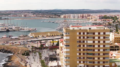 Vibrant-city-of-Torrevieja-in-Spain,-aerial-drone-orbit-view