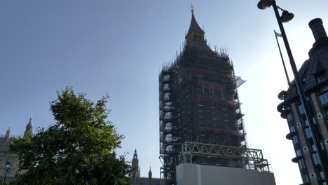 The-London-Big-Ben-Clock-Tower-under-reconstruction,-sunny-day,-tripod