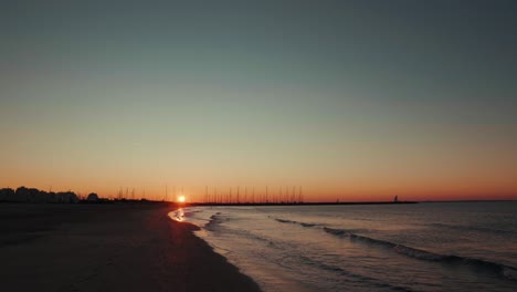 Walk-towards-the-sunrise-on-the-beach,-La-Grande---Motte,-Montpellier---France
