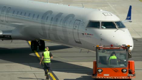 A-Close-up-of-pushback-towing-vehicle-in-action