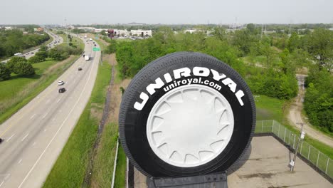 "The-Big-Tire",-Uniroyal-Tire-in-Detroit-Michigan-aerial-view-near-highway