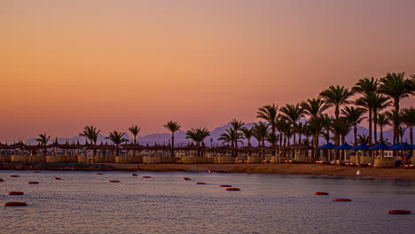Sunrise-time-lapse-on-the-Red-Sea-at-the-Beach-Albatros-Resort-in-Hurghada,-Egypt