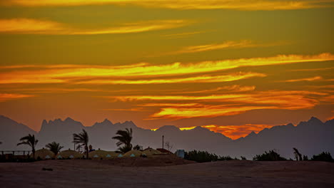 Rugged-mountain-and-desert-landscape-near-Hurghada,-Egypt---sunset-time-lapse