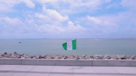 Victoria-Island,-Lagos,-Nigeria--October-1st,-2022:-Nigeria's-flag-blowing-in-the-wind-on-independence-day