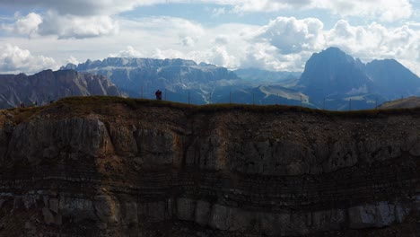 Aerial-View-Of-Seceda-Ridge-With-Hikers-Overlooking-The-Epic-Dolomite-Landscape
