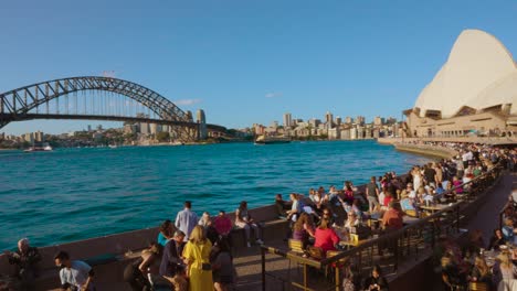 Tourists-and-big-cruiser-at-Sydney-Opera-House-at-circular-quay-in-Sydney-CBD