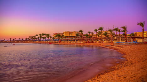 Colorful-sunrise-sky-along-a-Red-Sea-Beach---time-lapse-seascape