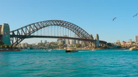 Tourists-and-big-cruiser-at-Sydney-Opera-House-at-circular-quay-in-Sydney-CBD