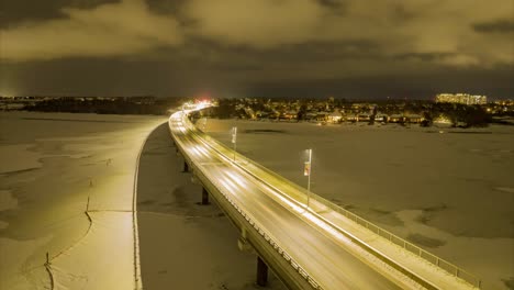 Aerial-Night-time-timelapse-of-highway-during-winter-