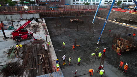 Aerial-view-of-first-floor-construction-work-in-Brooklyn,-NY,-USA---orbit,-drone-shot