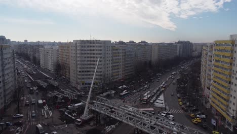 Aerial-Of-Bridge-Under-Construction-Over-A-Cross-Junction-At-Rush-Hour