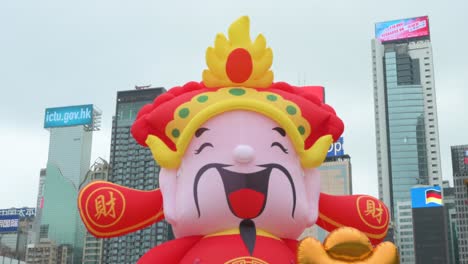 An-outdoor-Chinese-New-Year-theme-installation-event-for-the-Chinese-Lunar-New-Year-as-skyscrapers-are-seen-in-the-background-in-Hong-Kong