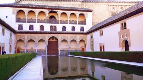 Rectangular-exterior-courtyard-with-a-pond-in-the-middle-in-the-Alhambra-of-Granada,-Spain