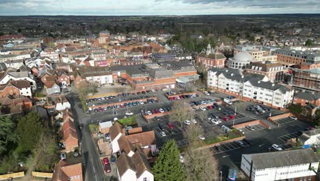 Braintree-Essex-UK-Drone,-Aerial,-panning-shot-of-town-centre-car-park-high-point-of-view
