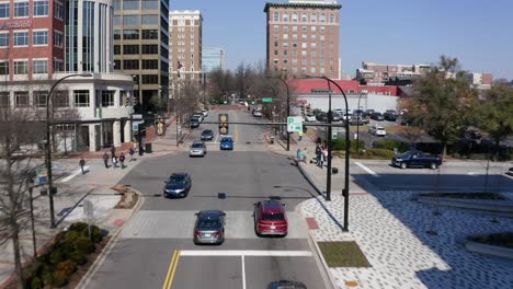 Aerial-flight-over-a-main-street-in-Greenville,-South-Carolina