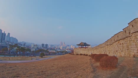 Asian-Korean-Hwaseong-fortress-rock-stone-wall-in-Suwon,-traditional-culture-architecture-object-UNESCO-heritage-wide-angle-panorama-view
