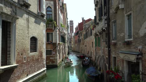 Old-traditional-gondola-boat-along-the-gran-canal-in-the-city-center-of-venice