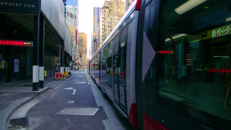 Trams-Travelling-In-The-George-Street-At-Central-Business-District-Of-Sydney-In-NSW,-Australia