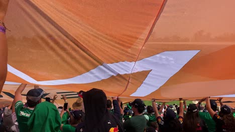 Fans-in-the-Bleachers-Covered-by-an-Orange-Advertisement-During-the-2021-F1-Mexico-City-Grand-Prix