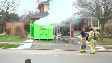 Firefighters-on-the-scene-after-putting-out-a-dumpster-fire