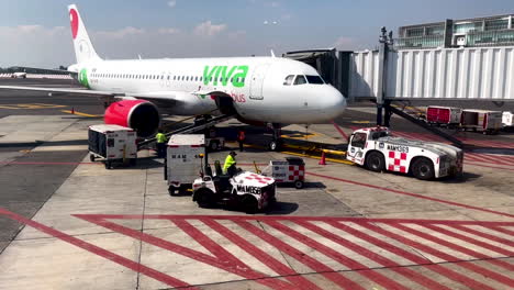 shot-of-airplane-at-mexico-city-airport-getting-prepared-to-take-off