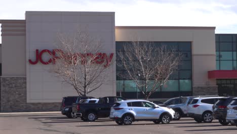 Shoppers-leaving-one-of-the-last-remaining-JCPenney-stores-post-bankruptcy-in-November-2021-prior-to-black-Friday