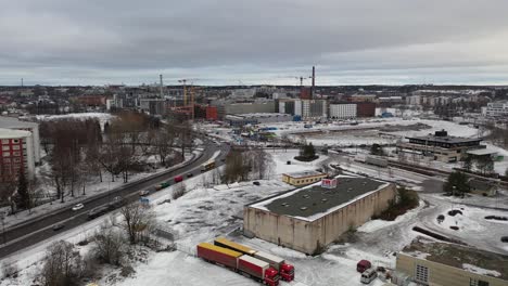 Aerial-view-of-cars-driving-slowly-in-city-center-with-flashing-lights-and-horns-blazing-protesting-against-high-fuel-prizes-at-gas-stations