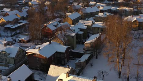 Drone-shot-of-snowy-Karlovas-wooden-houses