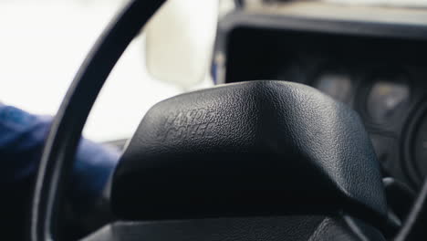 Close-Up-Shot-Of-Land-Rover-Defender-D90-Steering-Wheel-Showing-Company-Logo