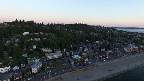 Aerial-view-pulling-out-towards-the-water-of-the-Alki-Beach-community