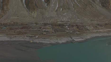 Aerial-View-Of-Fields-Near-Attabad-lake-In-Hunza-Valley
