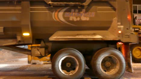 Winter-Service-Vehicles-Clearing-Snow-On-The-Road-At-Night-In-Mississauga,-Canada