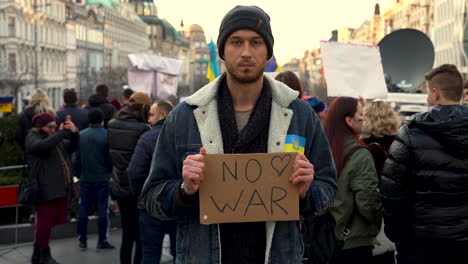Pacifist-activist-at-a-protest-rally-against-war-in-Ukraine-in-Prague