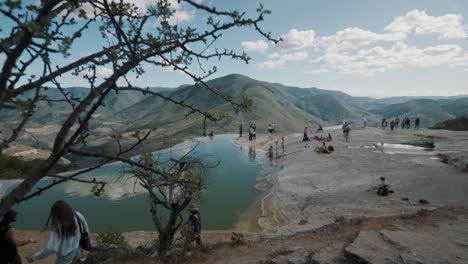 People-In-The-Natural-Springs-Hierve-El-Agua,-Oaxaca,-Mexico