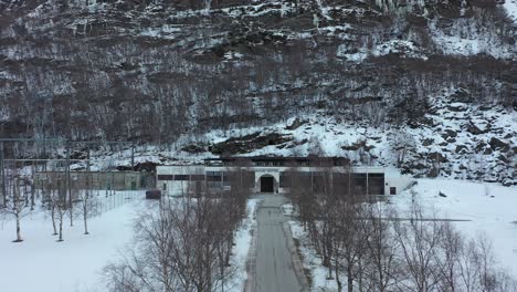Borgund-hydroelectric-powerplant-in-Laerdal-Sogn-Norway---Aerial-approaching-entrance-of-underground-powerplant