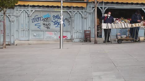 Iconic-book-stalls-at-pedestrian-street-Cuesta-de-Moyano,-in-Madrid,-Spain