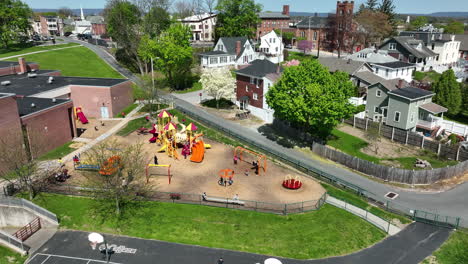 Schoolchildren-in-American-town-play-outside-at-recess