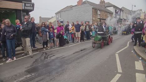 People-On-Roadside-Watching-The-Parade-Of-Steam-powered-Train-During-The-Celebration-Of-Trevithicks-Day-In-Camborne,-England