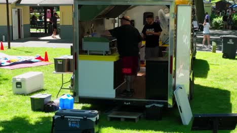 Man-cooks-in-food-truck