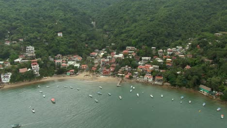 Floating-Boats-At-The-Remote-Fishing-Town-Of-Yelapa-In-Cabo-Corrientes,-Jalisco,-Mexico