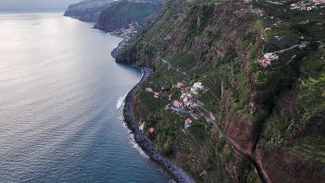 Impressive-terraced-farming-on-steep-cliffside,-Cascata-dos-Anjos,-Madeira