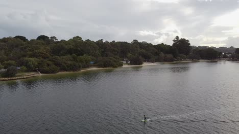 Aerial-Reverse-Shot-Of-An-E-Foil-Rider,-Point-Walter,-Perth