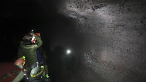 Inside-of-a-lava-tunnel-during-a-lava-cave-tour-in-Iceland