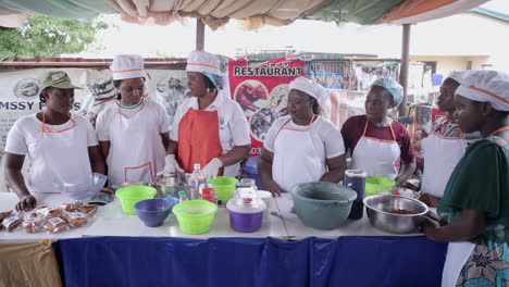 Instructor-at-a-National-Youth-Service-Corps-facility-how-to-make-fried-peanuts