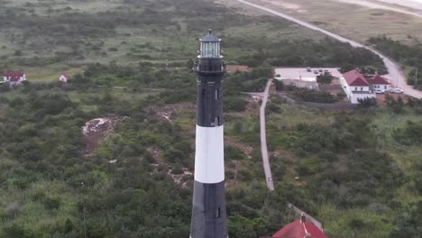 An-aerial-view-of-the-iconic-Fire-Island-Lighthouse-during-a-colorful-sunrise