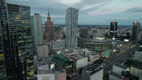 Aerial-view-of-the-financial-centre-of-Śródmieście-at-night-with-emblematic-skyscrapers-in-Poland