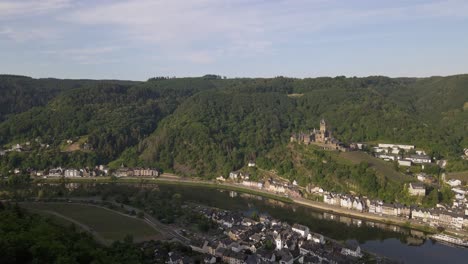Establishing-Shot-Of-The-Medieval-Castle-Of-Cochem-Castle-Flying-In-The-Morning-Sunrise
