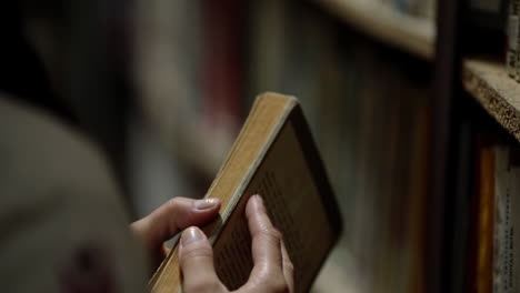 Romanian-girl-visits-the-old-library-in-Resita,-Romania-18