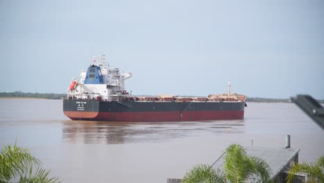 A-huge-ship-is-moving-cargo-on-Paraná-river,-Argentina