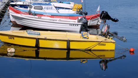 Colourful-fishing-boats-tied-in-blue-water-Sozopol-marina-black-sea-coast